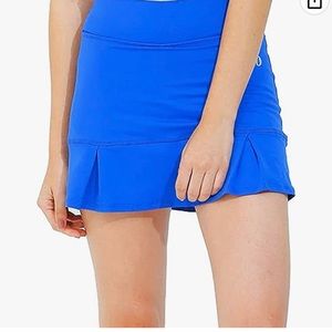 Dona Jo tennis skirt. Item is Navy color. Size small